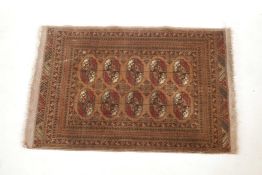 A brown ground Bokhara rug, 33½" x 53"