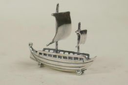 A 925 silver miniature boat, 1½" long