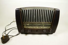 A 1950s Philips 'Triumph' Bakelite radio, model number: BIF 810A, serial number: 6324, dark brown