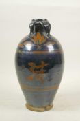 A Chinese Cizhou kiln pottery vase, with character mark decoration and four lug handles, 10½" high