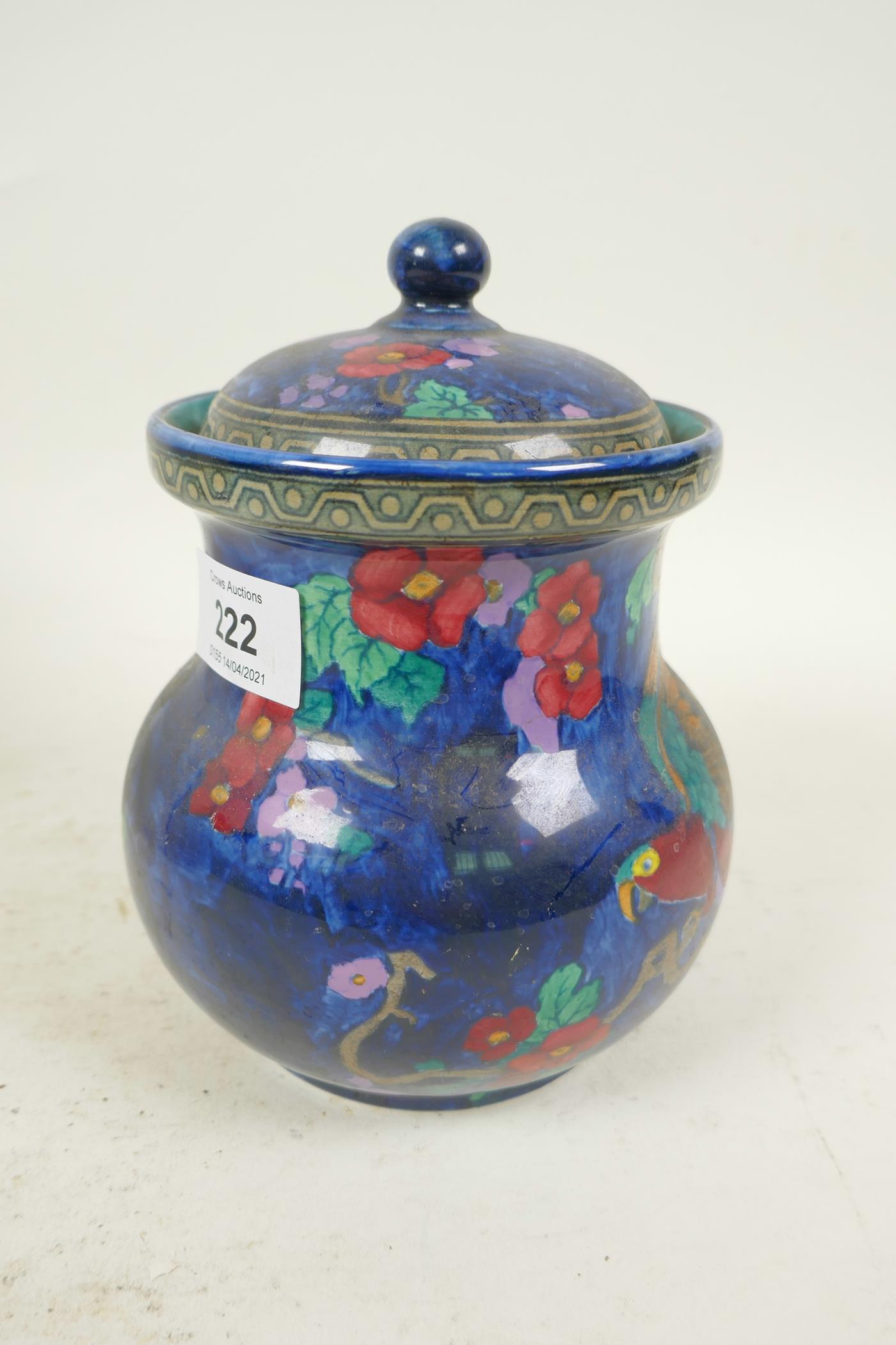 A Losol ware Andes pattern jar and cover decorated with parrot and flowers on a lustre blue - Image 2 of 4