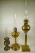 Three late Victorian brass oil lamp burners including glass chimneys, two beautifully cast in a