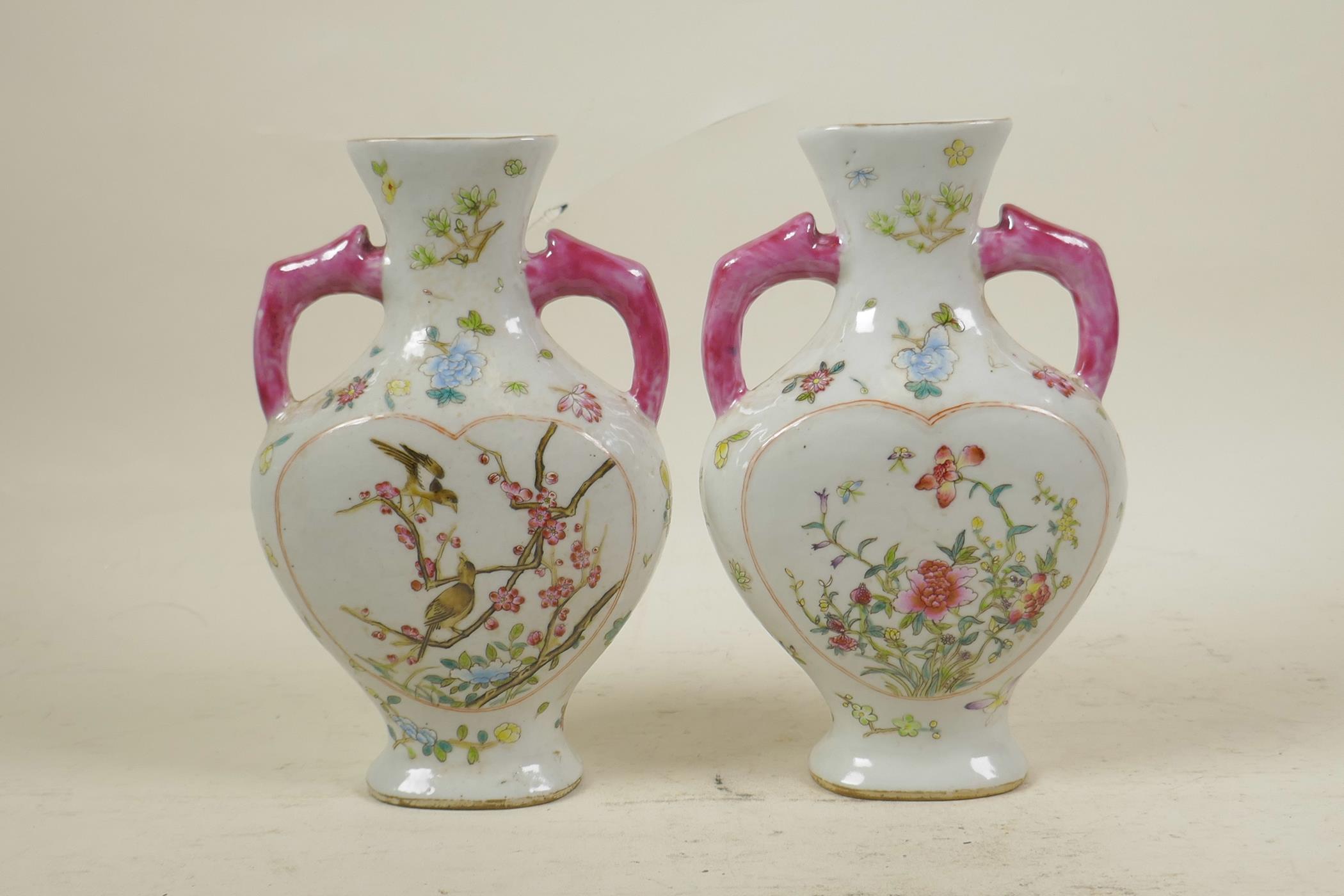 A pair of Chinese polychrome porcelain two handled vases with decorative heart shaped panels - Image 2 of 3