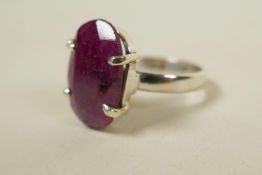 A sterling silver gemstone ring, inset with an 11ct natural red ruby, oval cut, hallmarked, 9g total