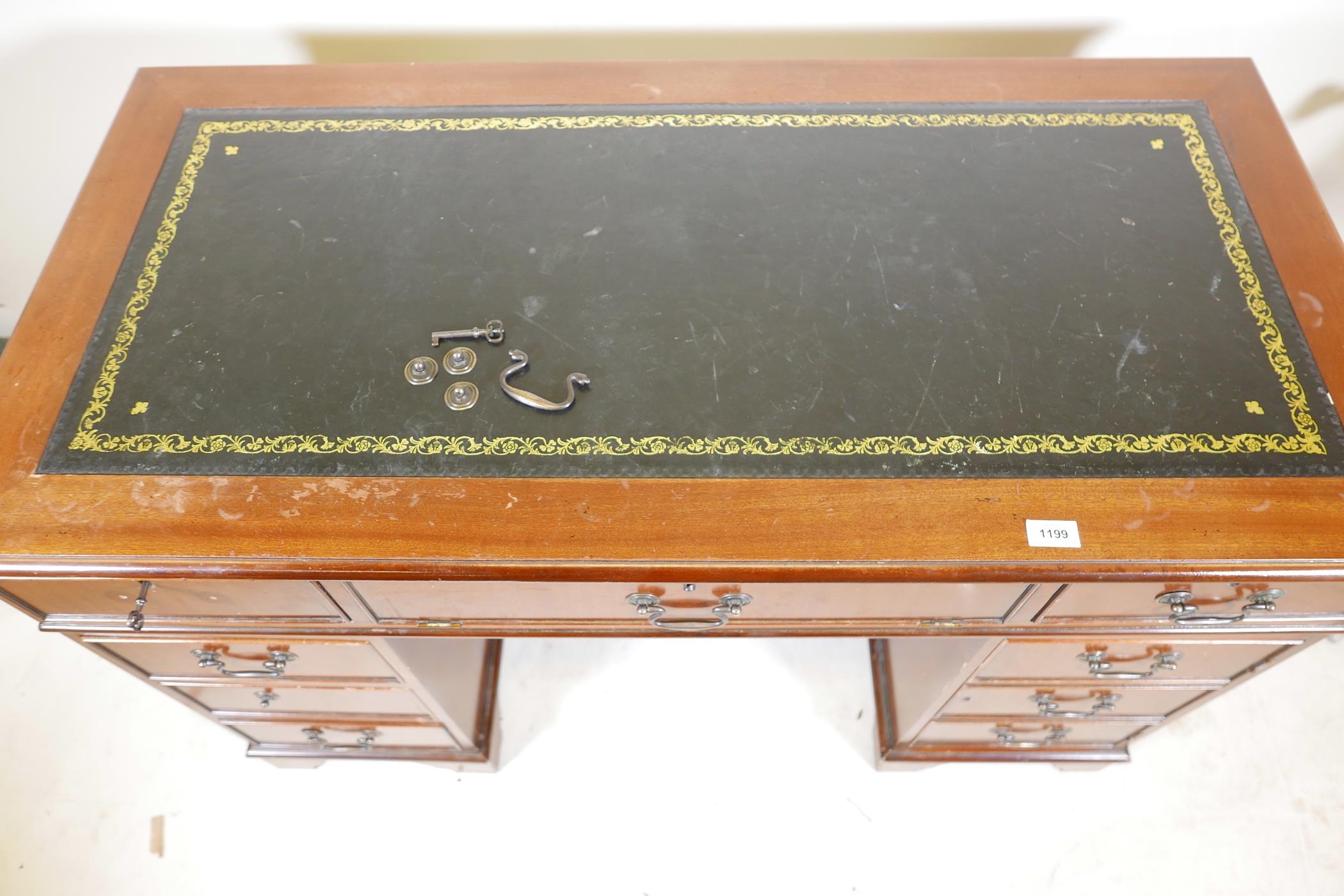 A mahogany pedestal desk with a tooled inset top, hidden keyboard drawer/slide, drawers and a - Image 4 of 6