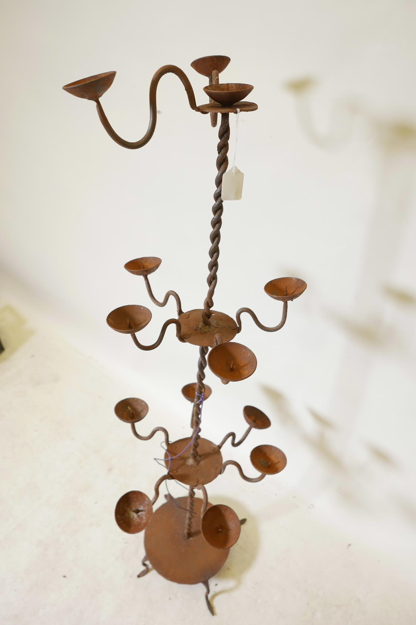 A wrought iron floor standing pricket candlestick, A/F missing branches, 43" high - Image 3 of 3
