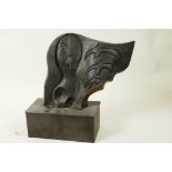 A modernist pressed bronze sculpture in the style of Picasso on a rectangular plinth, 9" high