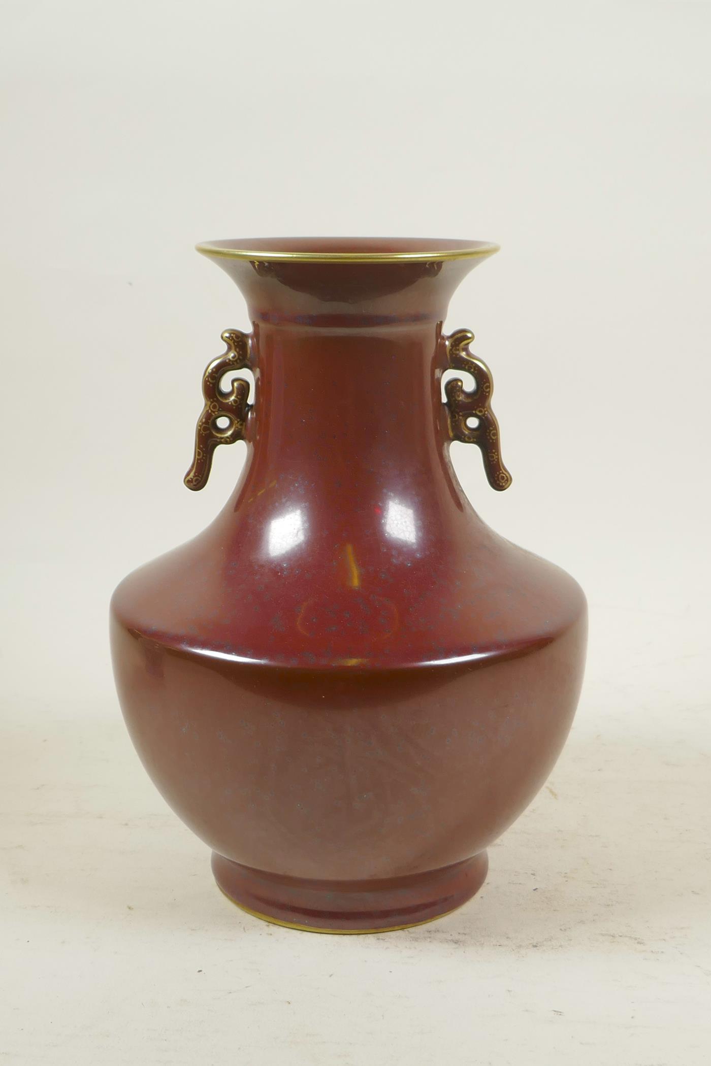 A Chinese copper glazed porcelain two handled vase with gilt details, impressed seal mark to base, - Image 3 of 5