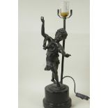 A bronzed metal table lamp cast as a figure of a dancing girl on a plinth base, 17" high