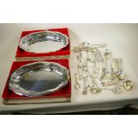 Three boxed stainless steel serving dishes together with a quantity of flatware including sifter