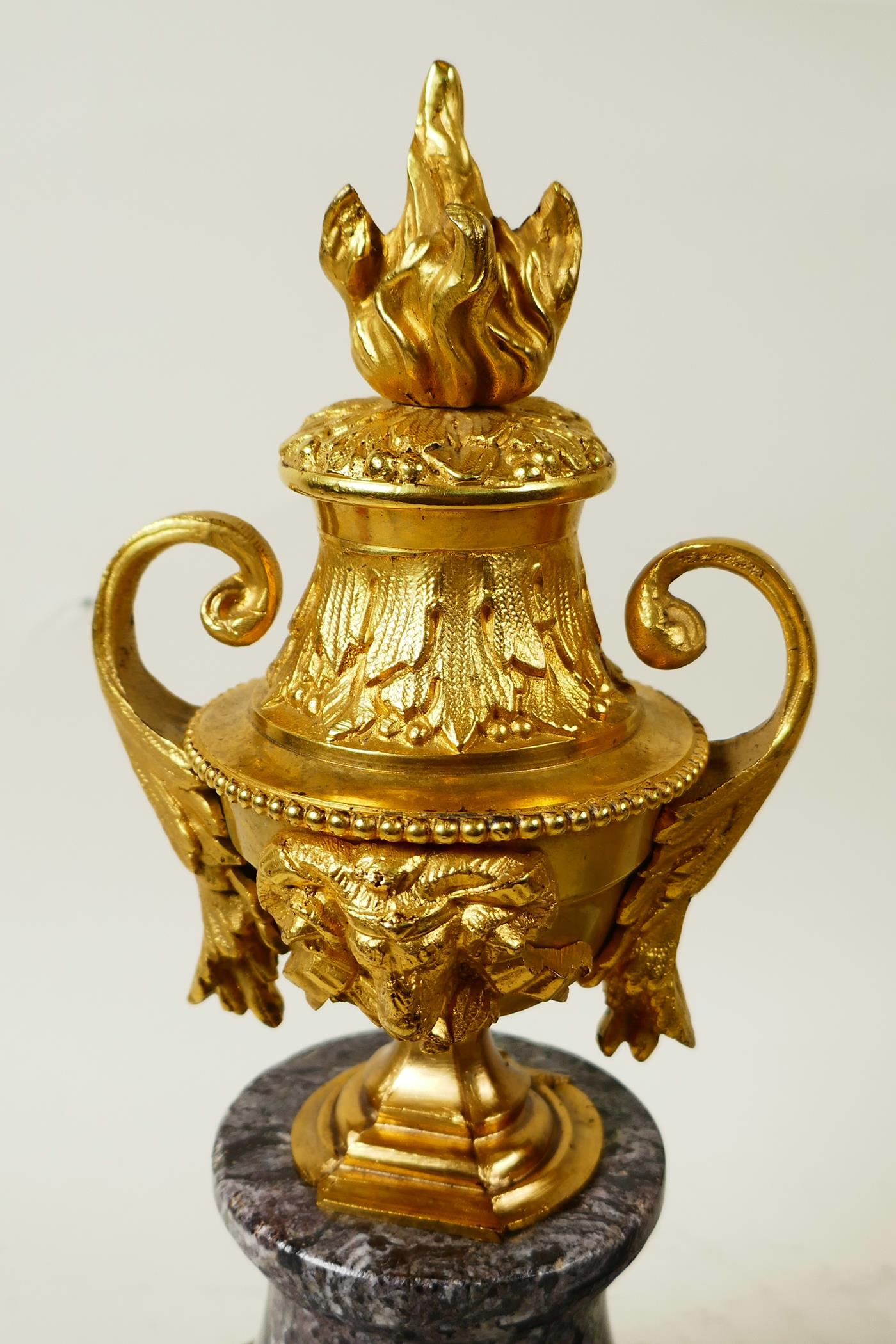 A pair of ormolu side urns with ram's mask decoration, mounted on marble socles, 10½" high - Image 3 of 3