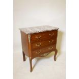 A marble topped mahogany three drawer commode with boxwood lining and inset burr walnut panels, with