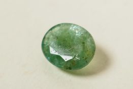 A 4.52ct natural green emerald, oval mixed cut, IDT certified, with certificate