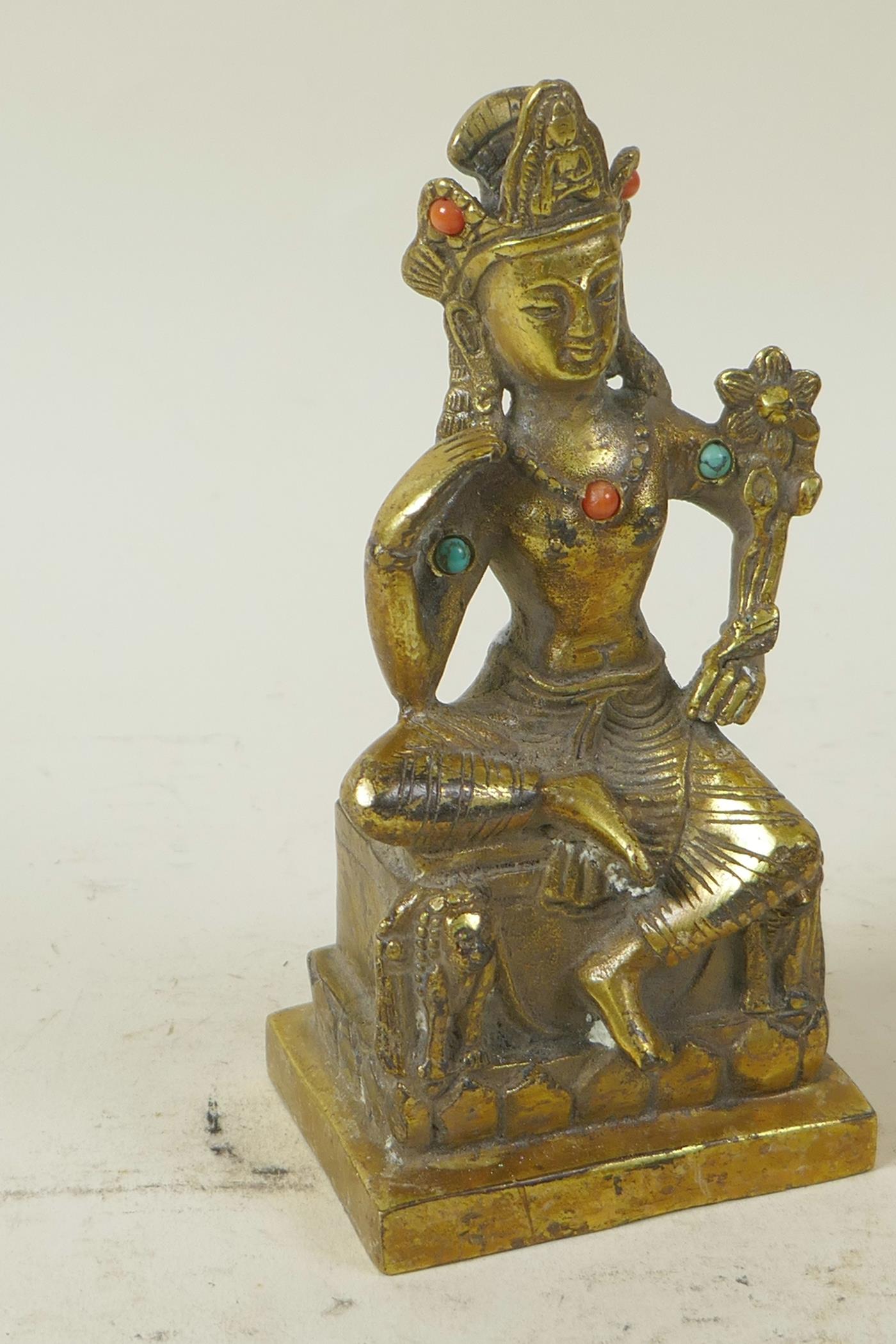 A Sino-Tibetan gilt brass figure of a seated deity embellished with turquoise and coral beads, 5½" - Image 3 of 5