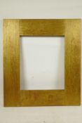 An early C20th Arts and Crafts style gilded oak picture frame, rebate size 12" x 10"