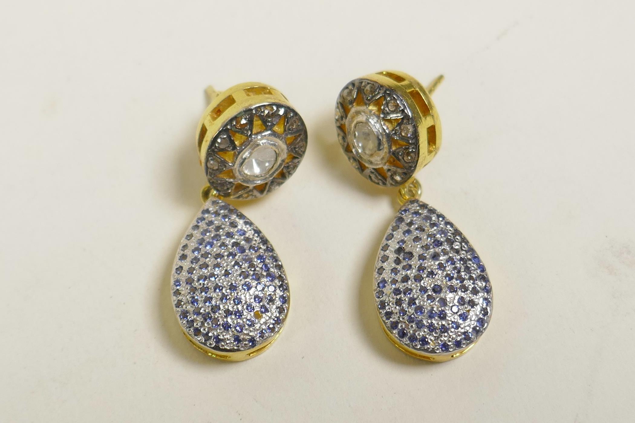 A pair of silver gilt uncut diamond and sapphire cluster drop earrings