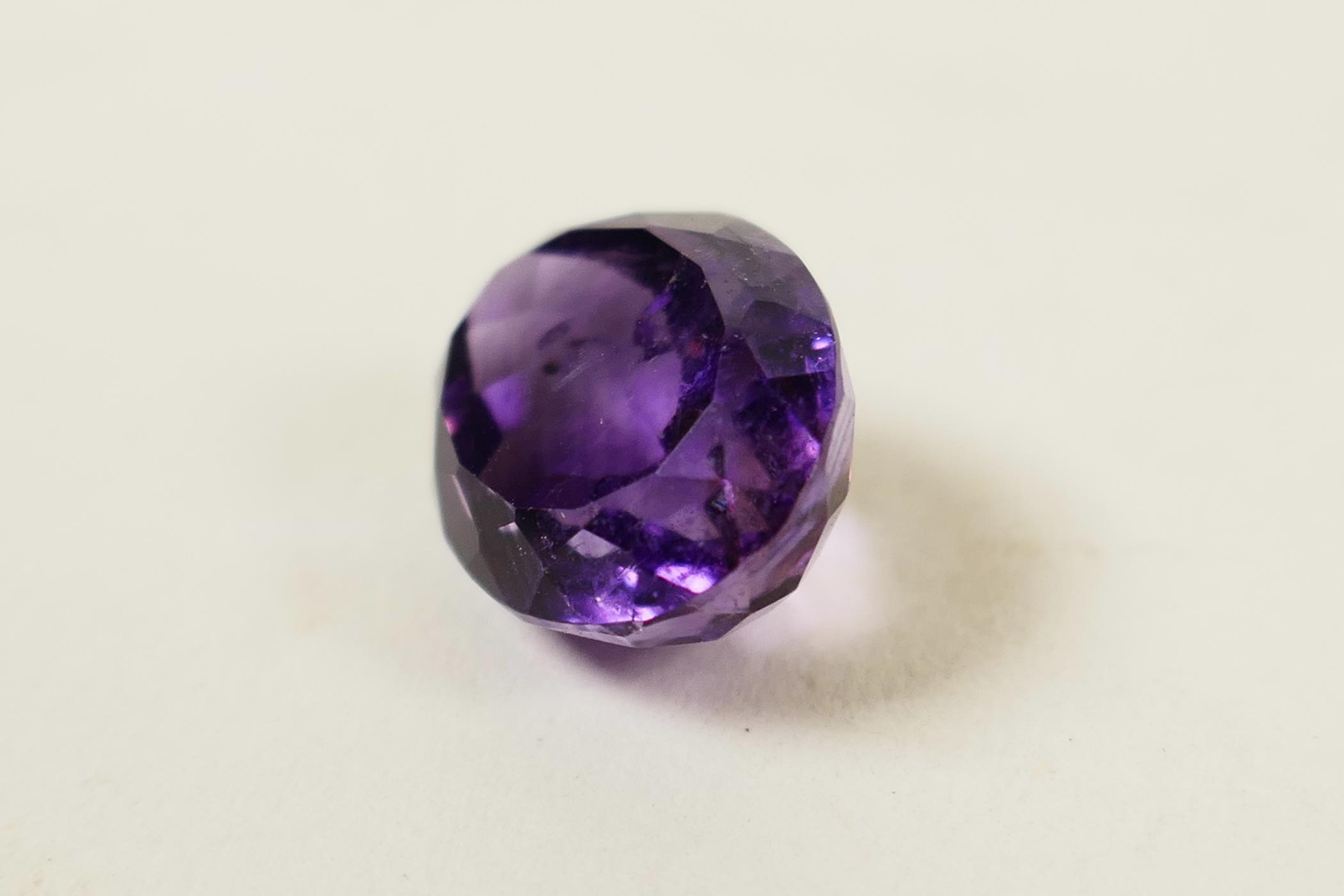 A 6.04ct natural dark purple amethyst, oval mixed cut, certified laboratory tested, with certificate - Image 2 of 5