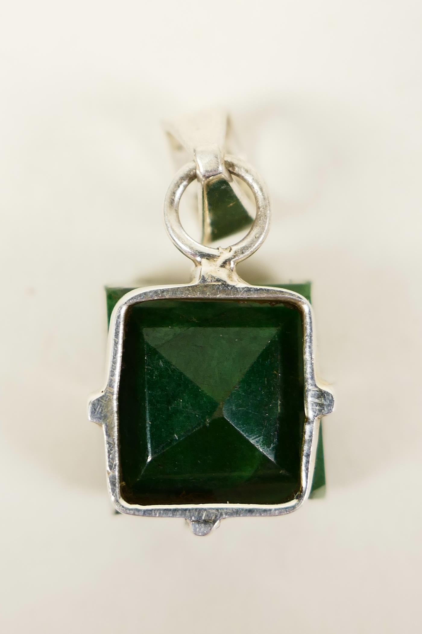 A striking pendant featuring a 12ct square cut natural green emerald, set in sterling silver, - Image 3 of 5