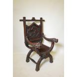 A Chinese throne chair, with carved back and dragon arms raised with on shaped front supports,