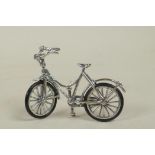 A novelty 925 silver model of a bicycle, 2½" long