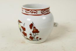 A Chinese porcelain bird feeder jar with single handle decorated with birds and blossom, 2½" high