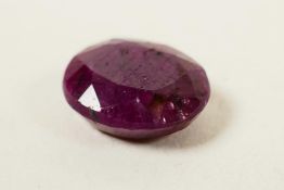 A 12.06ct red ruby, oval mixed cut, IDT certified, with certificate