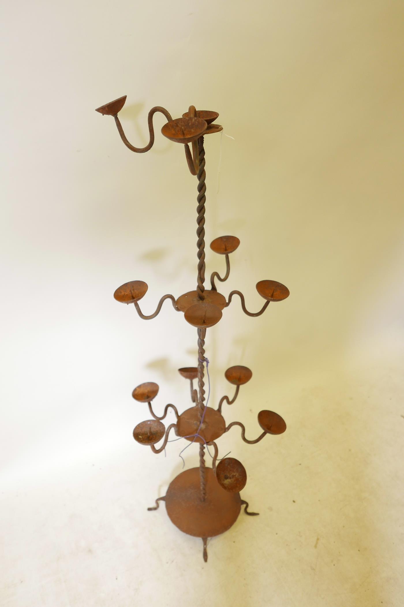 A wrought iron floor standing pricket candlestick, A/F missing branches, 43" high - Image 2 of 3