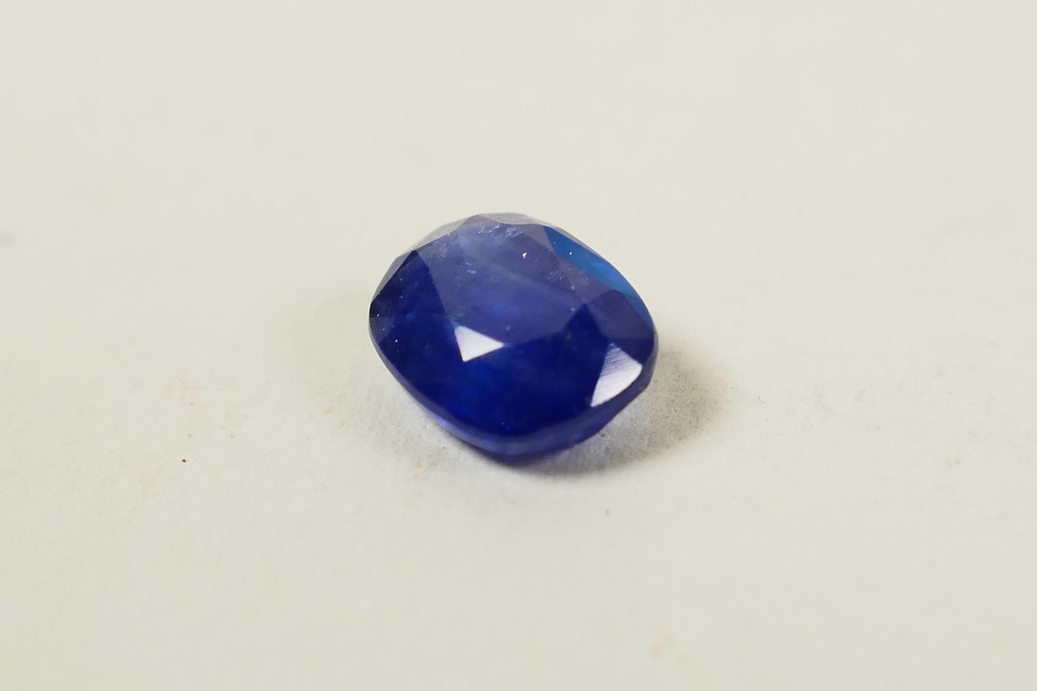 A 1.69ct natural blue sapphire from Sri Lanka, oval cushion mixed cut, GJSPC certified with - Image 2 of 7
