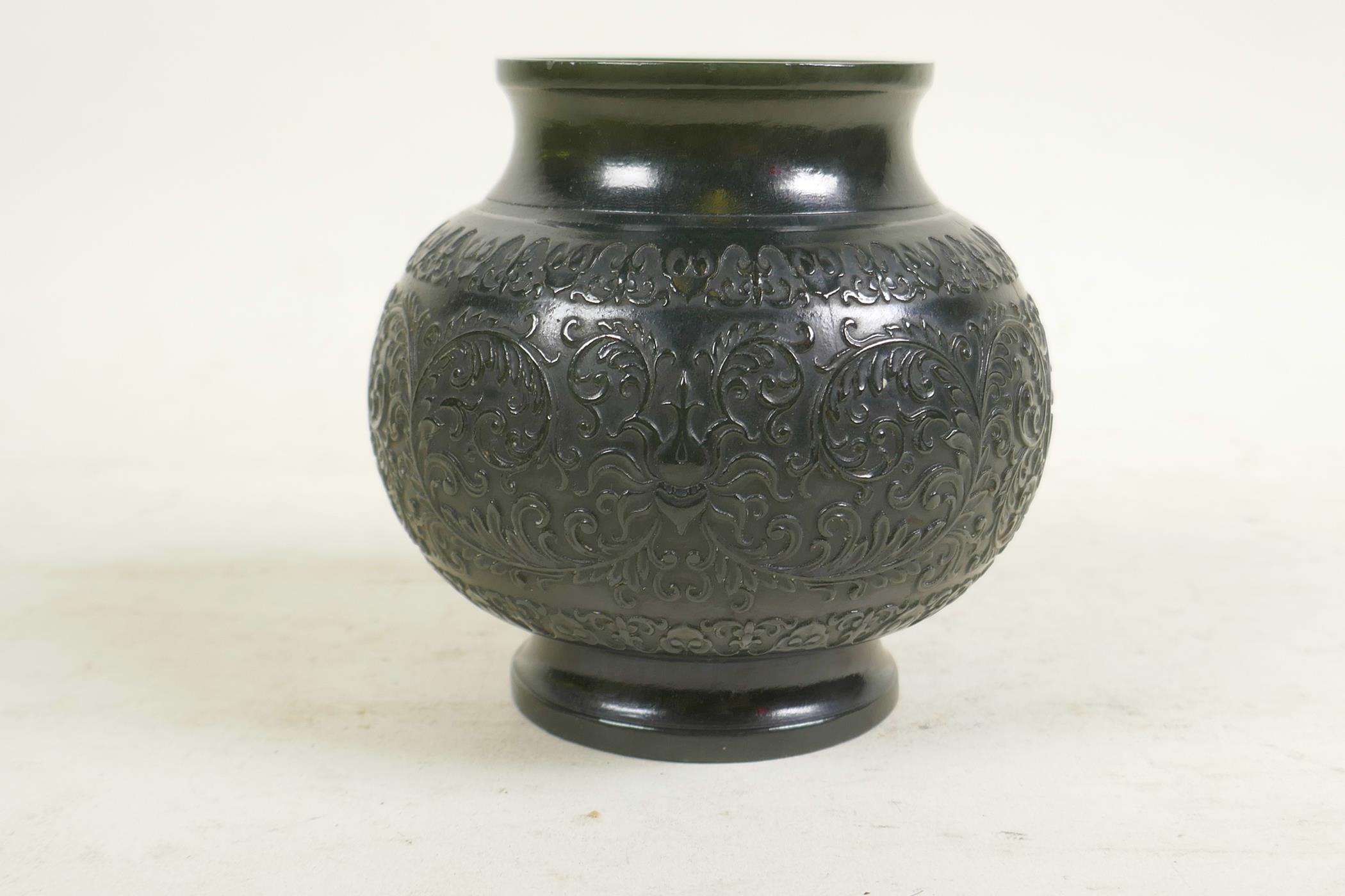 A Chinese spinach jade pot with carved scrolling lotus flower and character decoration, 4" high - Image 2 of 5