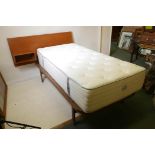A 1970s single bed frame and head board by Myer, with a Hamseys Sleep Centres Premier 4000 firm