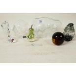 A collection of glass paperweights; a Kosta glass plaque of polar bears, a Mats Jonasson squirrel,