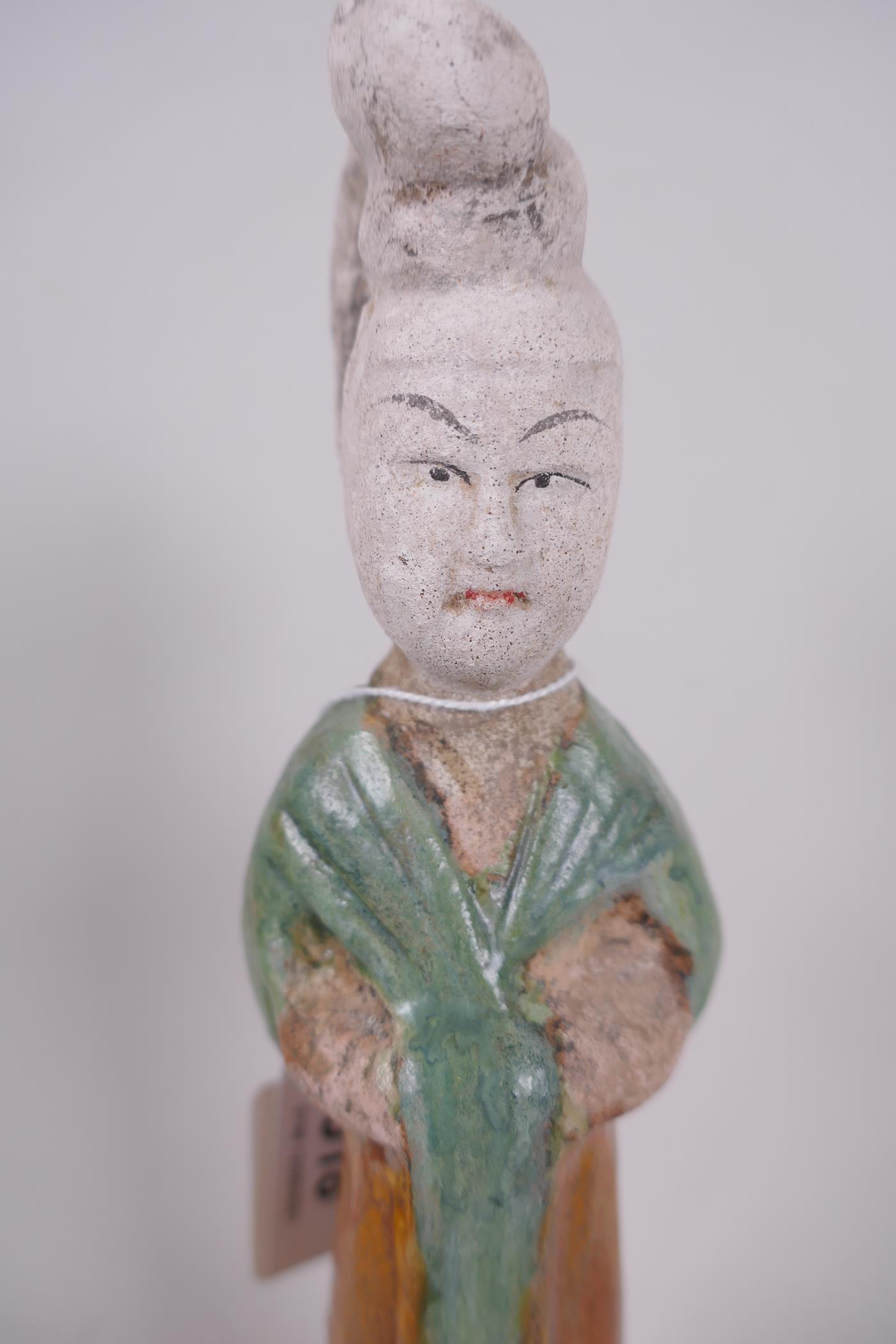 A Chinese Tang dynasty (618-907AD) terracotta figure of a court lady, Sancai glazed in original - Image 2 of 6