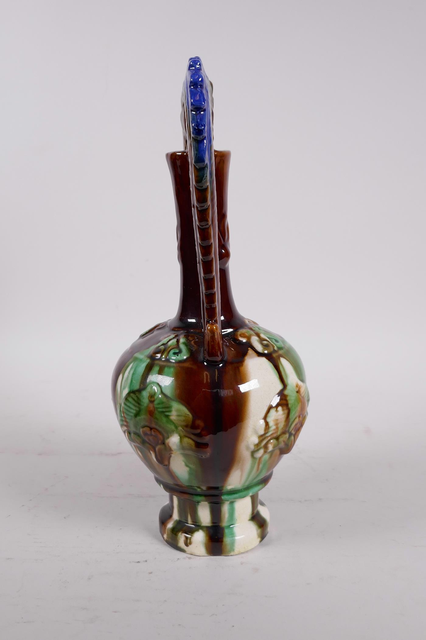 A Chinese Sancai glazed pottery vase with a slender neck and two handles in the form of dragons, - Image 4 of 6