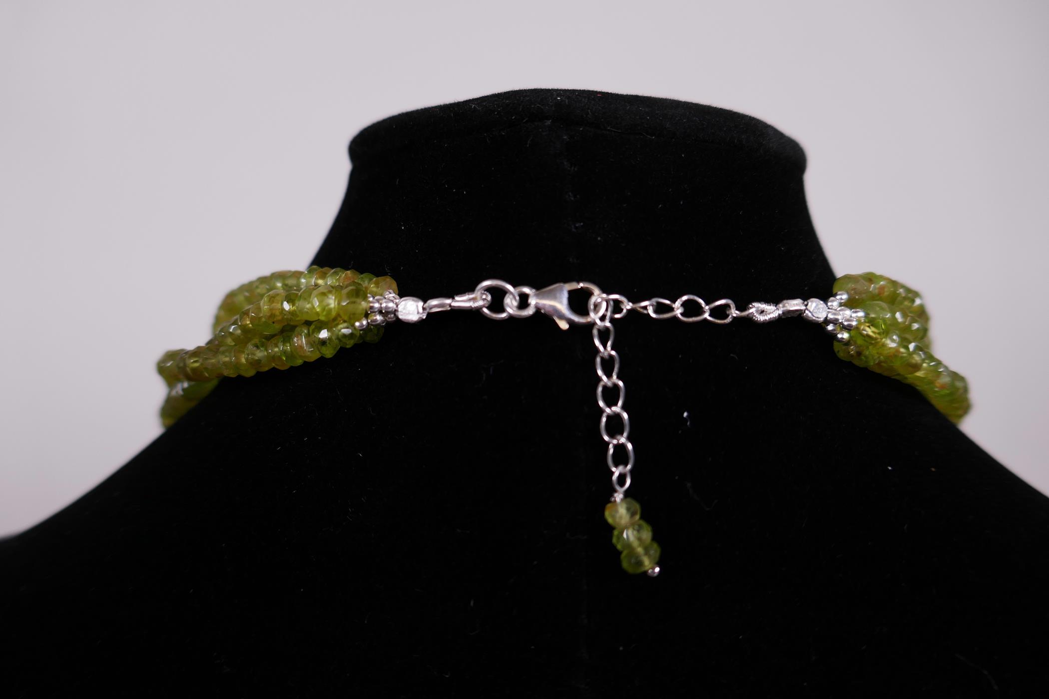 A four row green peridot gemstone necklace, with adjustable silver clasp, 18" long - Image 6 of 8