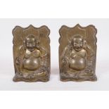A pair of vintage brass bookends in the form of seated Buddhas, 6½" high