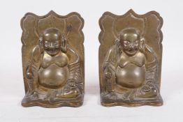 A pair of vintage brass bookends in the form of seated Buddhas, 6½" high