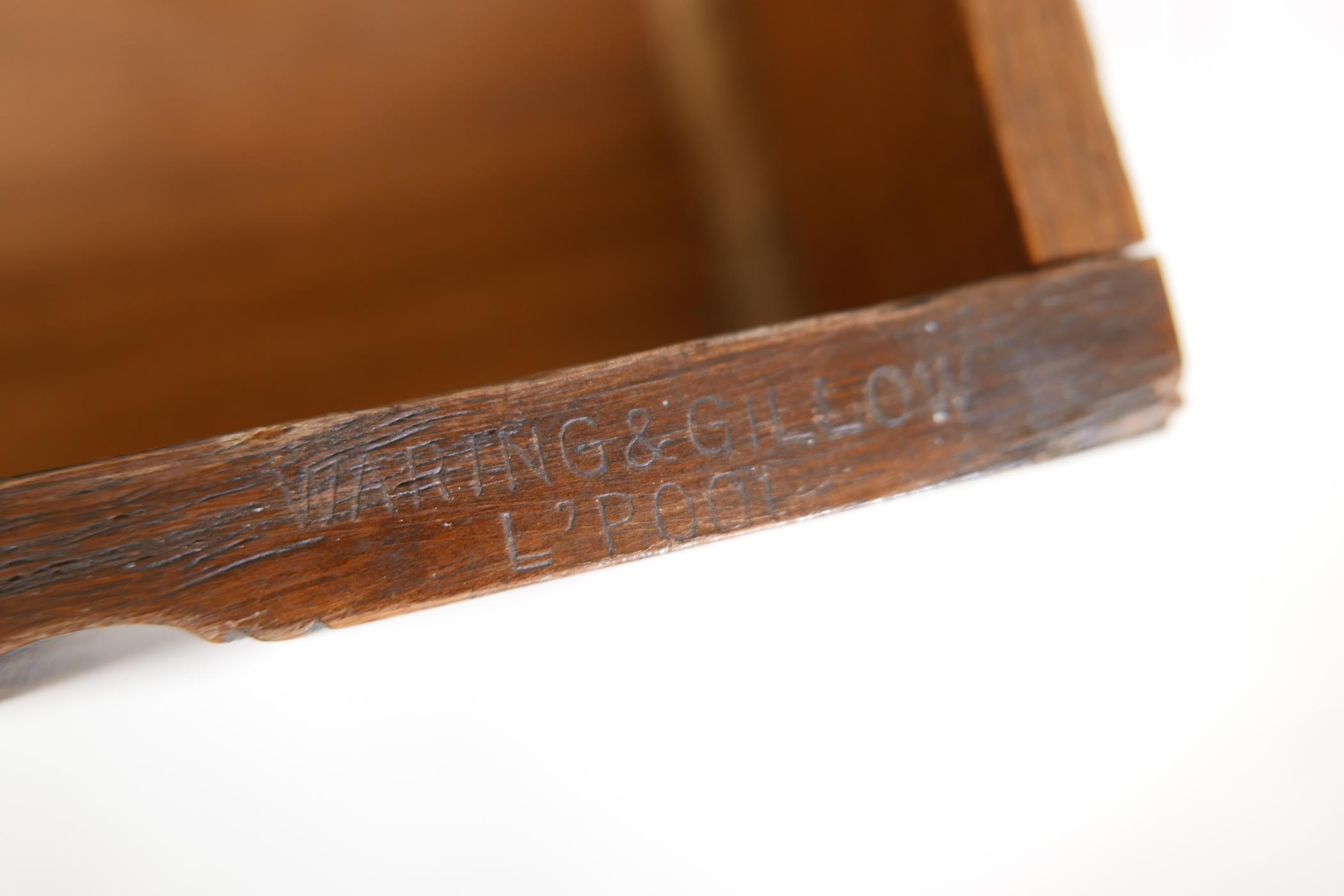 A Waring & Gillow oak dropleaf side table incorporating a revolving bookcase, raised on - Image 4 of 6