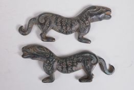 A pair of Chinese bronze scroll weights in the form of kylin, character inscription to bodies, 5"