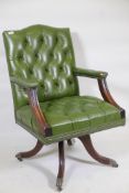 A button leather swivel desk armchair