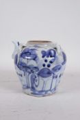 An early C20th Oriental blue and white porcelain pourer with four lug handles, 5" high