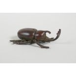 A Japanese Jizai style Eastern Hercules beetle, 2½" long