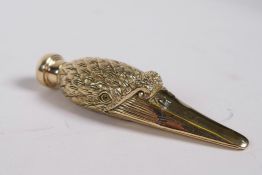 An 18ct gold plated perfume bottle in the form of a duck's head, 3½" long