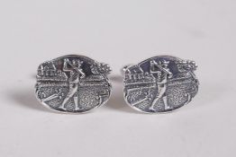 A pair of 925 silver cufflinks with golfing decoration