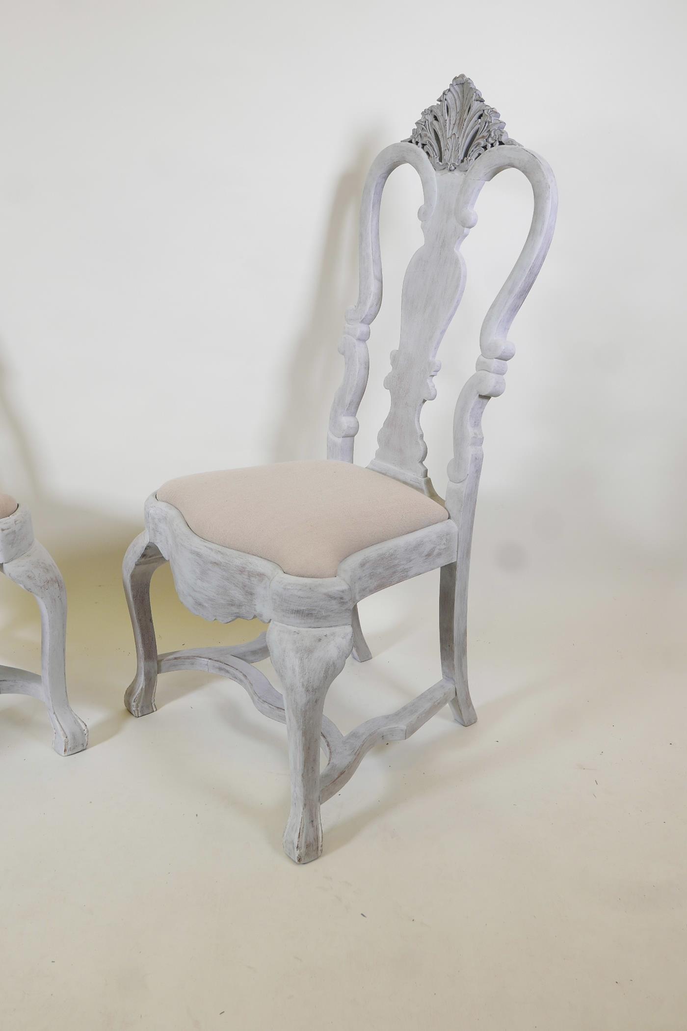 A pair of early C20th Gustavian style painted and distressed chairs, with carved details, 45" high - Image 2 of 3