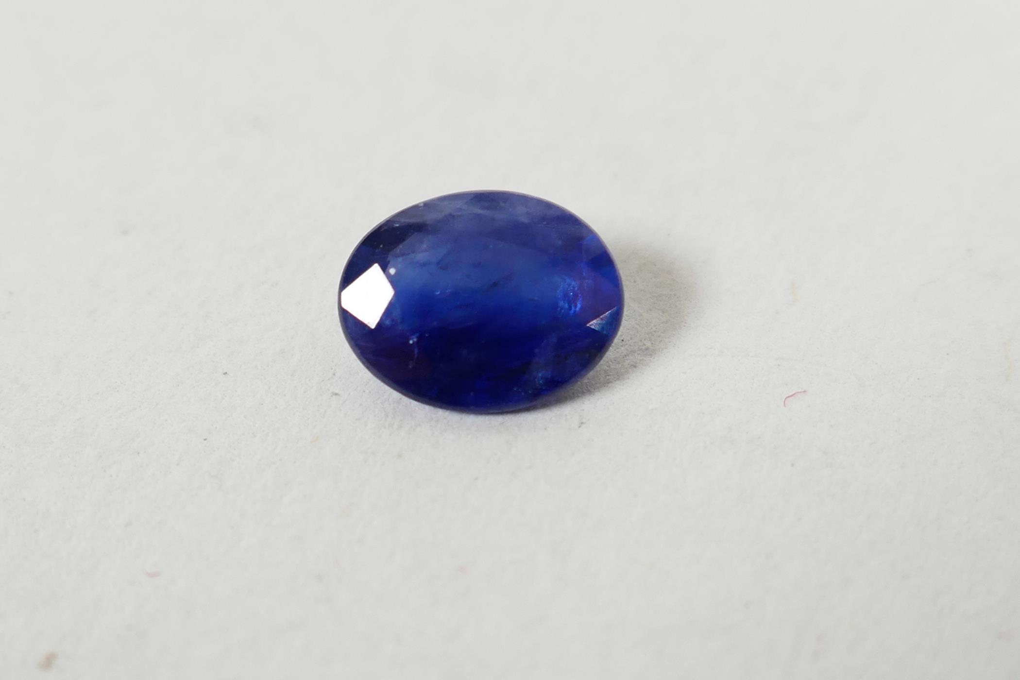 A 1.06ct blue sapphire, oval mixed cut, ITLGR certified, with certificate - Image 6 of 7