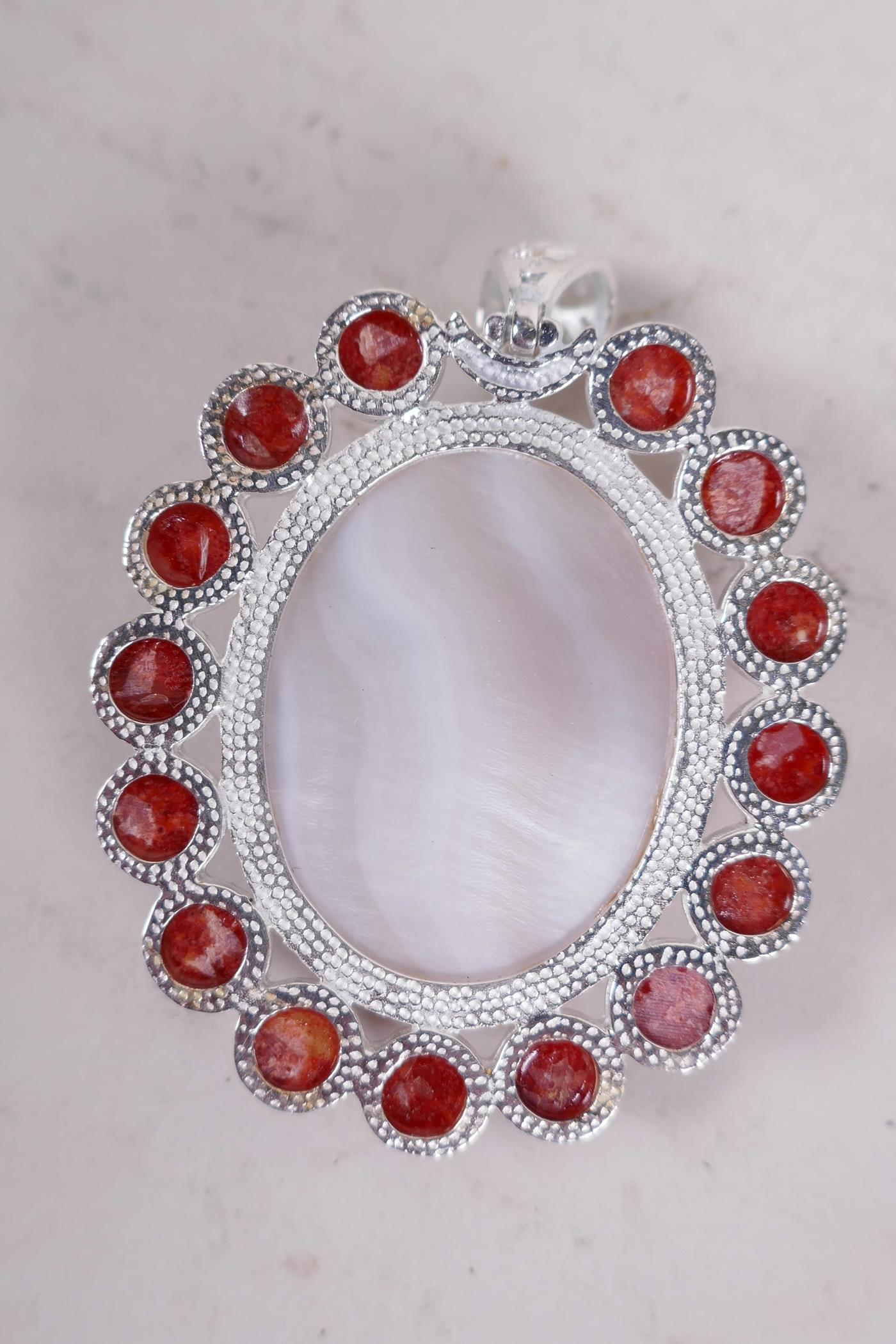 An oval mother of pearl and coral set pendant, 2½" long - Image 2 of 2