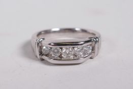A 14ct white gold and diamond set ring, approximate size 'O'