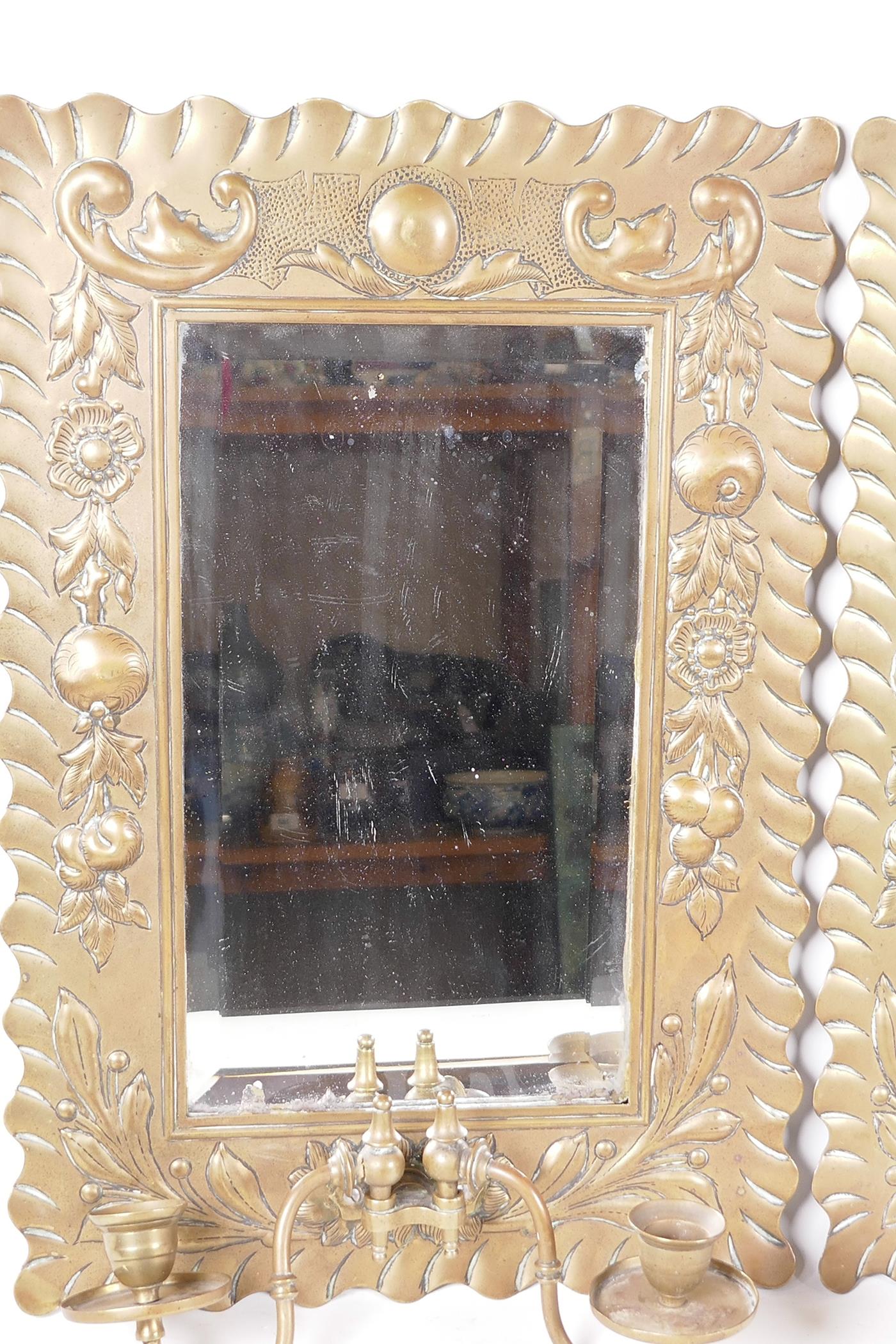 A pair of C19th pressed brass framed pier glass wall mirrors with twin candle sconces, the frames - Image 7 of 7