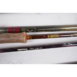 A vintage Hardy Bros Fibalite 7ft spinning rod, together with a Shakespeare Sigma Graphite 1760-