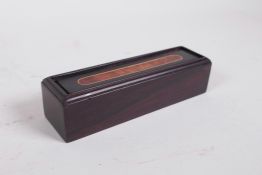 A Chinese hardwood seal box with inset burr walnut decoration, 4½" x 1½"